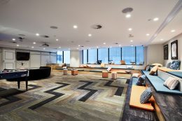 Interior photography of a contemporary design corporate office break out area with a pool table and lounge
